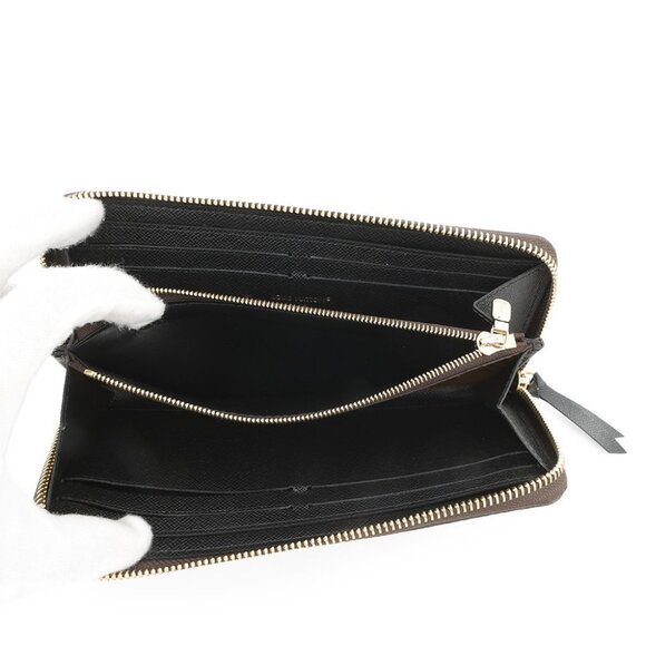 LOUIS VUITTON Portefeuille Clemence Monogram Reverse Canvas Noir - Picture 13 of 13